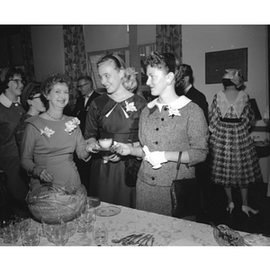 Three women at a Freshman Tea reception