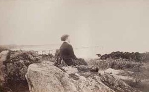 Mrs. Joseph Bell on rock at Smith's Point