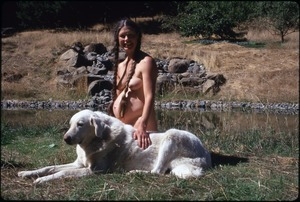 Sandi nine months pregnant, with Maya dog
