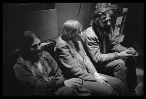 Judy Collins, Joni Mitchell, and unidentified man seated on a couch in Wally Heider Studio 3 during production of the first Crosby, Stills, and Nash album