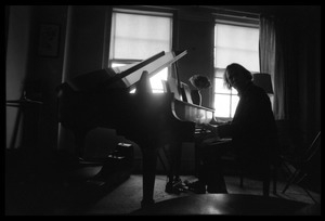 Stephen Stills playing piano in Judy Collins's New York apartment
