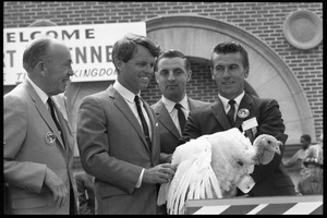 From left: Gov. Karl Rolvaag, Robert F. Kennedy, Walter Mondale, unidentified man, and turkey (bottom) at the Turkey Day festivities