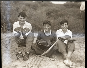 Clamming: three boys with enormous clams