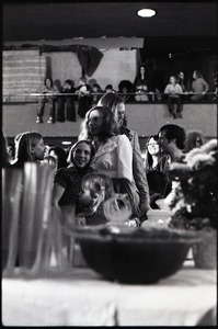 Wedding of Jim and Anne Baker: Jim and Anne mingling among kids standing by the punch bowl