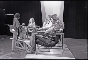 Commune members at the WGBY Catch 44 (public access television) interview: Anne Baker, Jim Baker, and Bruce Geisler on stage