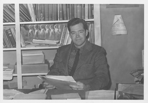William C. Starkweather at his desk