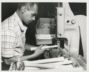 Man constructing hammers