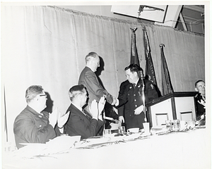 Mayor John F. Collins at a Saint Patrick's Day celebration.