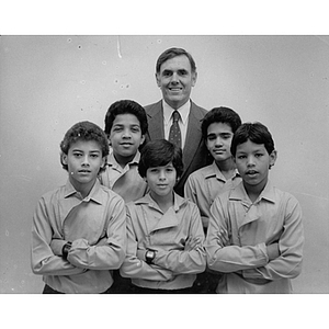 Mayor Raymond Flynn stands with five Latino boys