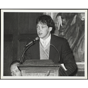 A young man speaking from the podium at a Boys' Club Recognition Dinner