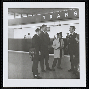 Members of the Keystone Club standing near the ticketing counter