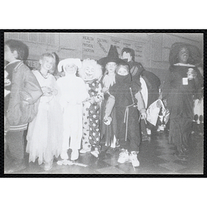 Children in costumes attend a Halloween party