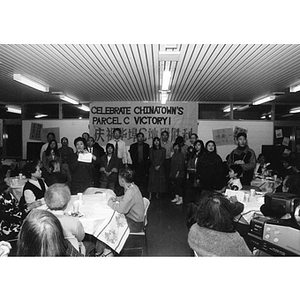 Attendees are acknowledged for their hard work at a dinner marking Chinatown's victory to build a community center on Parcel C