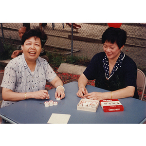 Women playing Chinese chess during Recreation Day