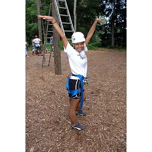 Melanie Arvajo poses at the Torch Scholars Project Adventure Ropes Course