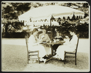 Group of women having tea, location unknown, undated