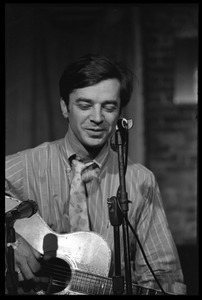 Robert L. Jones performing on stage at the closing of Club 47