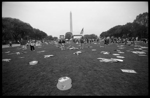 Signs from the March for Women's Lives scattered across the National Mall, with the Washington Monument in the background