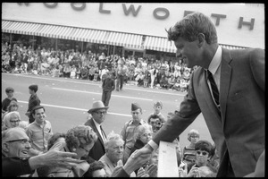 Robert F. Kennedy greeting the crowd across the street from the Woolworth store in Worthington during the Turkey Day festivities