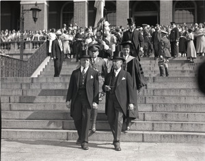 Govs. Alfred E. Smith and Joseph Buell Ely (r. to l.) descending steps at a reception for Smith in front of the Massachusetts State House