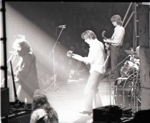 Grateful Dead concert at Springfield Civic Center: band in performance: Jerry Garcia, Bob Weir, and Phil Lesh (l. to r.)