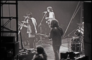 Grateful Dead concert at Springfield Civic Center: band in performance, backup singer, Bob Weir, Phil Lesh, and Jerry Garcia