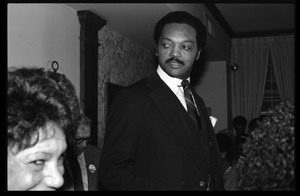 Jesse Jackson at the podium, addressing supporters