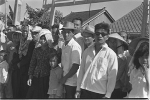 Vietnamese men in street, Saigon.