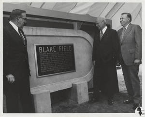 Wilbert E. Locklin and S. Prestley Blake standing by Blake Field dedication plaque (1973)