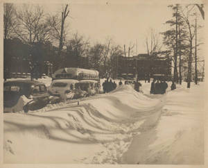 A wintry scene of the Marsh Memorial and the Alumni Hall at Springfield College, ca. 1930