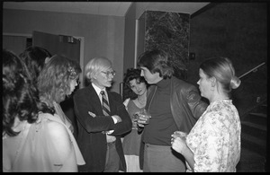 Andy Warhol mingling with the crowd at a reception at the Birmingham Museum of Art