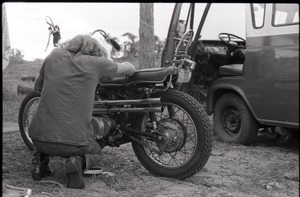 Man working on motorcycle
