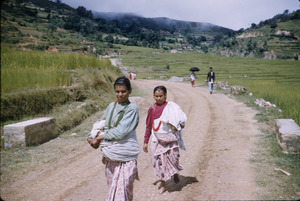 Women walking to a festival