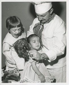 Leslee Trimble, Rosa Gonzales and chef Michael Malone with turkey