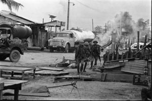 Roadblock set by Vietcong across Hau Giang Boulevard; Saigon.