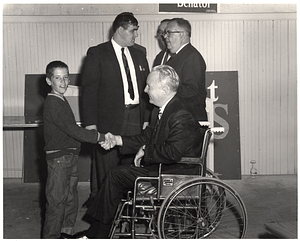 Mayor John F. Collins with five unidentified individuals