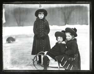 Two girls on sled
