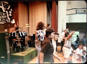 Rapunzel concert, on stage at local school(?): kids on stage with the band