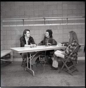 Bob Weir sitting at table with Mitch Sieser and Anne Baker (l. to r.)