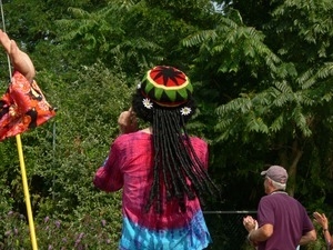Parade marchers with fake dreadlocks : Provincetown Carnival parade