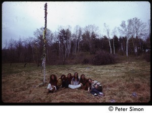 Group of celebrants seated by the maypole, Tree Frog Farm Commune