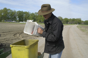 Lazy Acres Farm (Zuchowski Farm): Allan Zuchowski loading corn seed into his planter