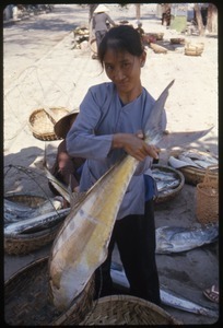 Woman selling fish