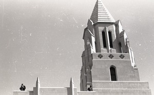 Moratorium to End the War in Vietnam: man with camera on roof of College of Arts and Science building, Boston University
