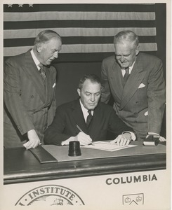 Joseph Campbell, treasurer at Columbia University, signing affiliation agreement