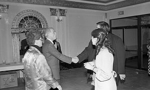 Mayor Kevin H. White with three unidentified people at the Strand Theatre