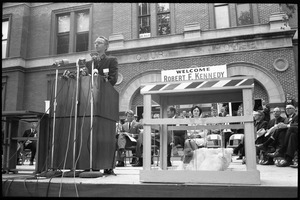 Speaker introducing Robert F. Kennedy, speaking on behalf of Democratic candidates in front of the Noble County courthouse