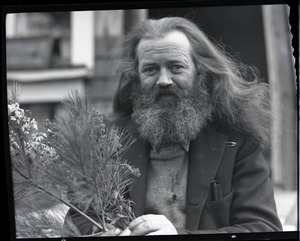 Charles Coffin, The Maine Hermit, holding bouquet of asters and white pine
