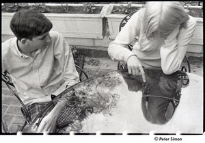 Peter Simon and Karen Helberg, playing with water on a table top