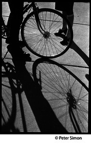 Bicycle and shadows on a sidewalk, Boston University